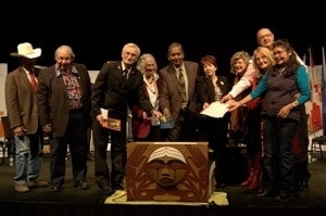 Adding the CCC's Expression of Reconciliation to the Bentwood Box at the 2014 TRC event in Edmonton.