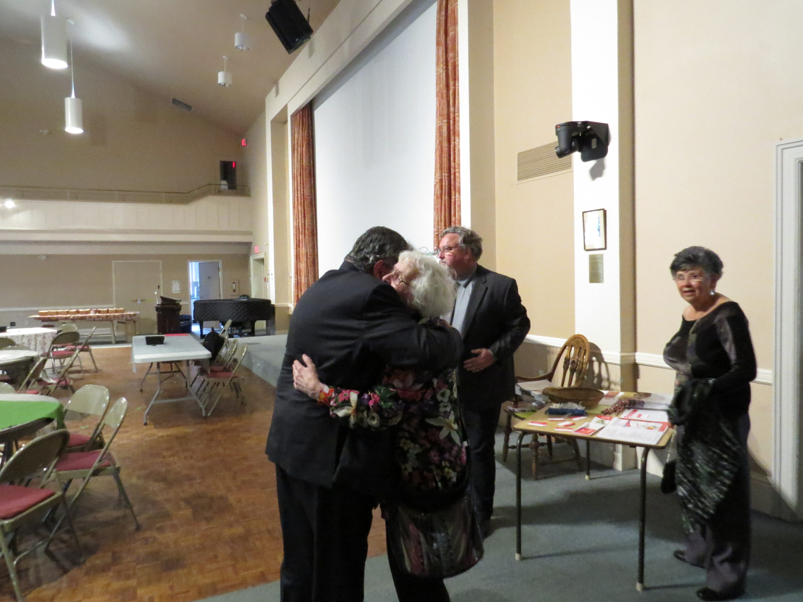 Richard embracing Janet Somerville, General Secretary of the Council from 1997 - 2002 during festivities for the 75th Anniversary of the Council on September 26, 2019. Many of us will remember Richard's warm affection for so many he encountered.